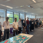 Groupe de managers en formation professionnelle sur la posture managériale