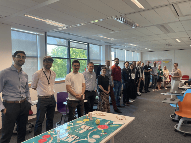 Groupe de managers en formation professionnelle sur la posture managériale